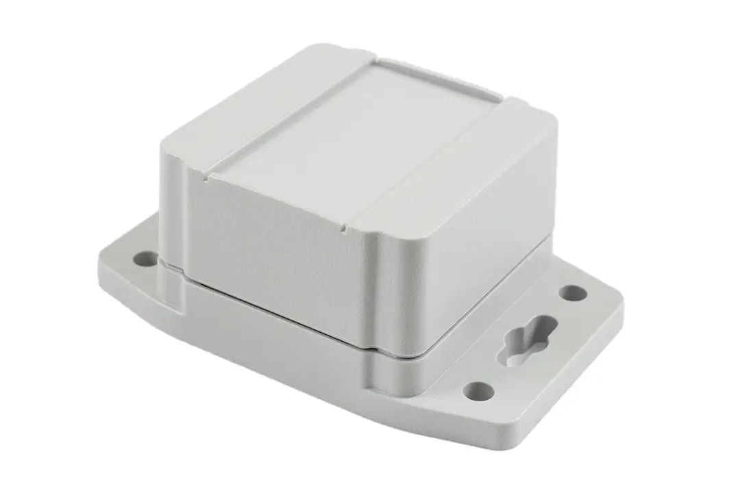 Produktfoto 1 von Hammond 1555F; Gehäuse; Polycarbonat; Hellgrau Geflanscht IP68 Breite 65 mm Höhe 42.4 mm Länge 65 mm