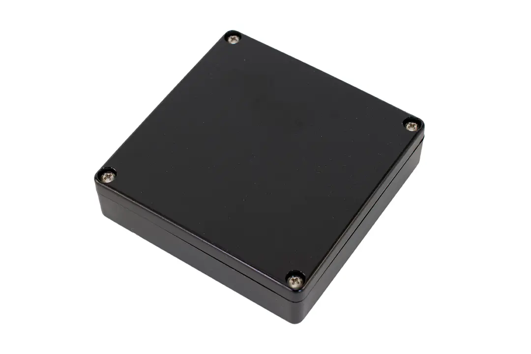 Produktfoto 1 von Hammond 1551W; Gehäuse; Polycarbonat; Grau, Schwarz IP68 Breite 80 mm Höhe 24 mm Länge 80 mm